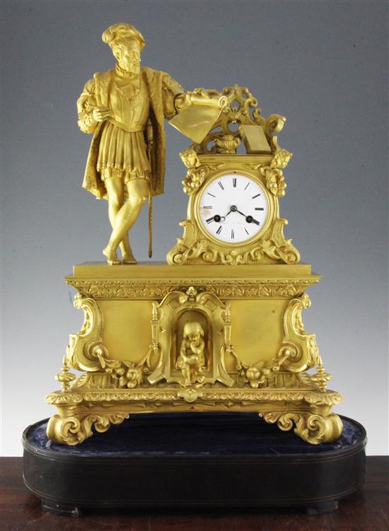 A 19th century French ormolu mantel clock, clock 22.5in., with ebonised stand